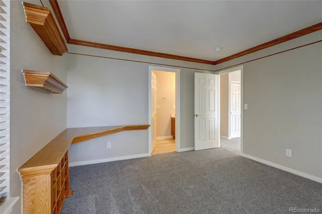 a view of a room that has a window in it