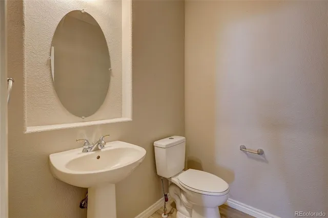 a view of a kitchen with cabinets