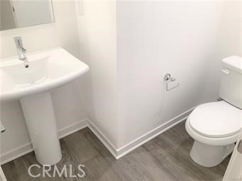 315 Placemark Irvine, CA 92614 - Photo 21 of 23 a bathroom with a sink and a toilet