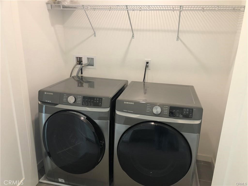 315 Placemark Irvine, CA 92614 - Photo 23 of 23 a utility room with dryer and washer