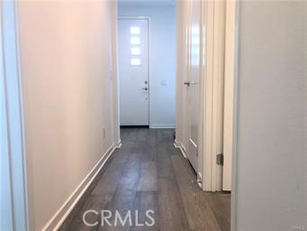 315 Placemark Irvine, CA 92614 - Photo 8 of 23 a view of a hallway with wooden floor