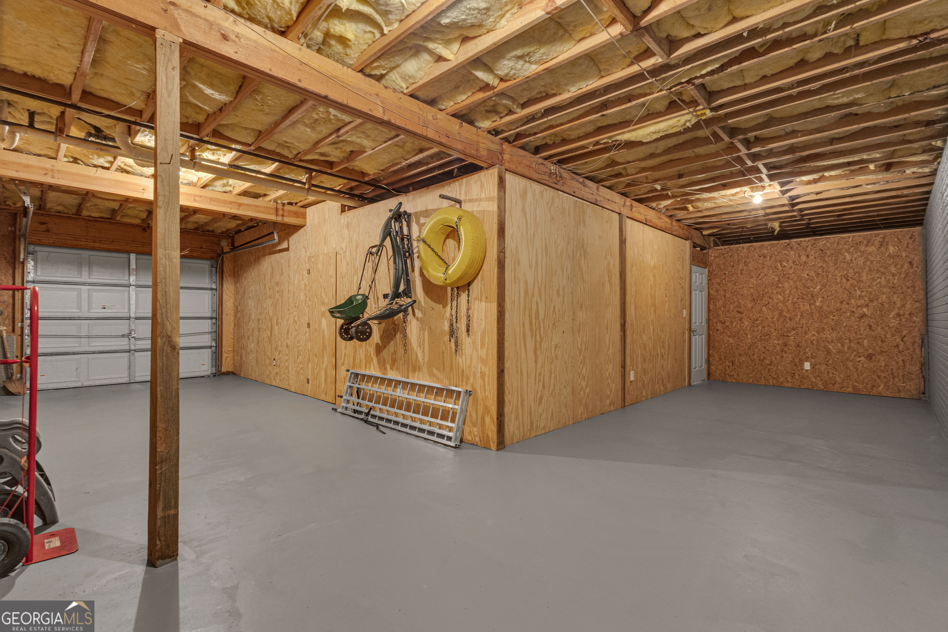 918 Scarletts Walk Locust Grove, GA 30248 - Photo 34 of 46 a view of storage and utility room