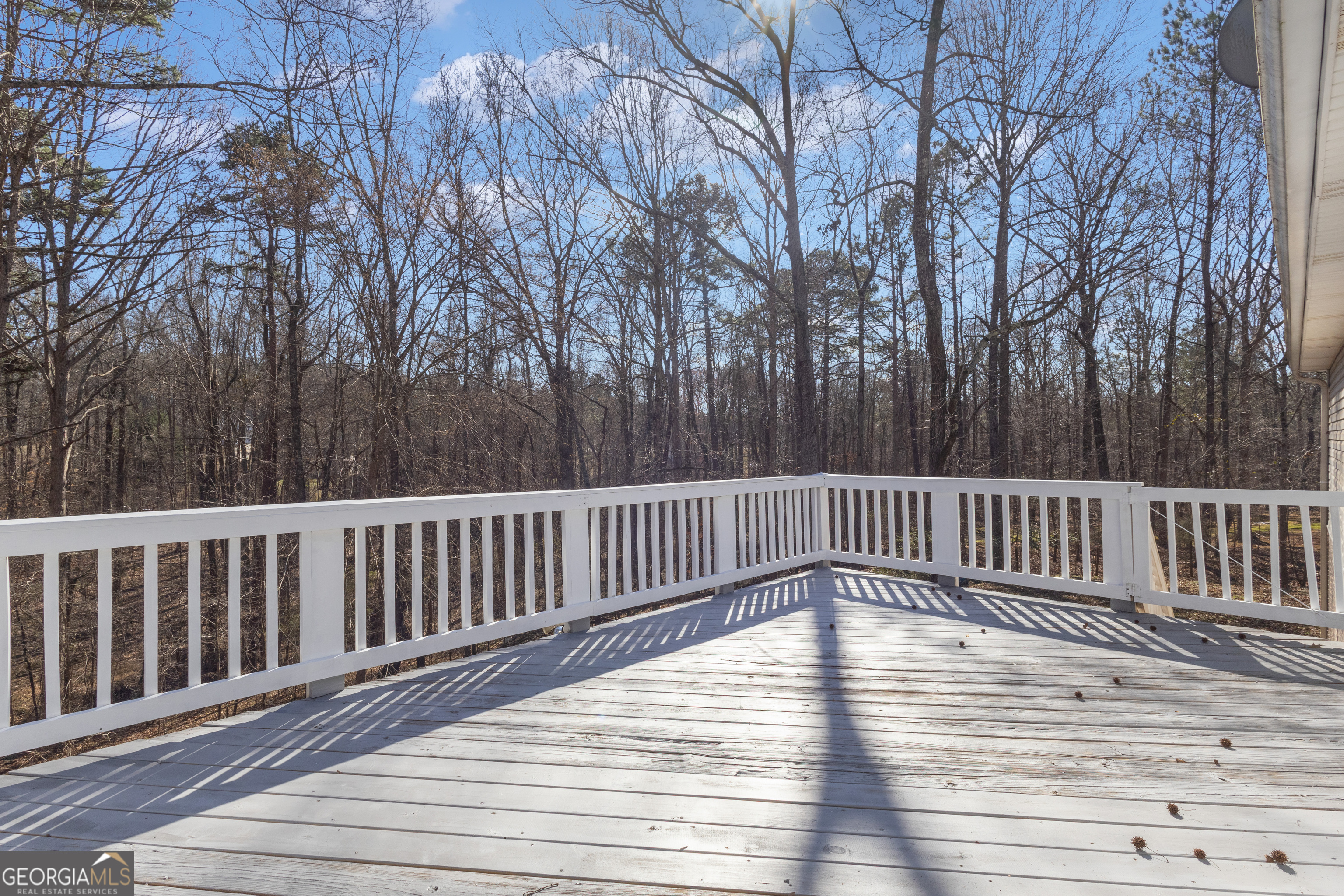 918 Scarletts Walk Locust Grove, GA 30248 - Photo 36 of 46 a view of deck with wooden floor and fence