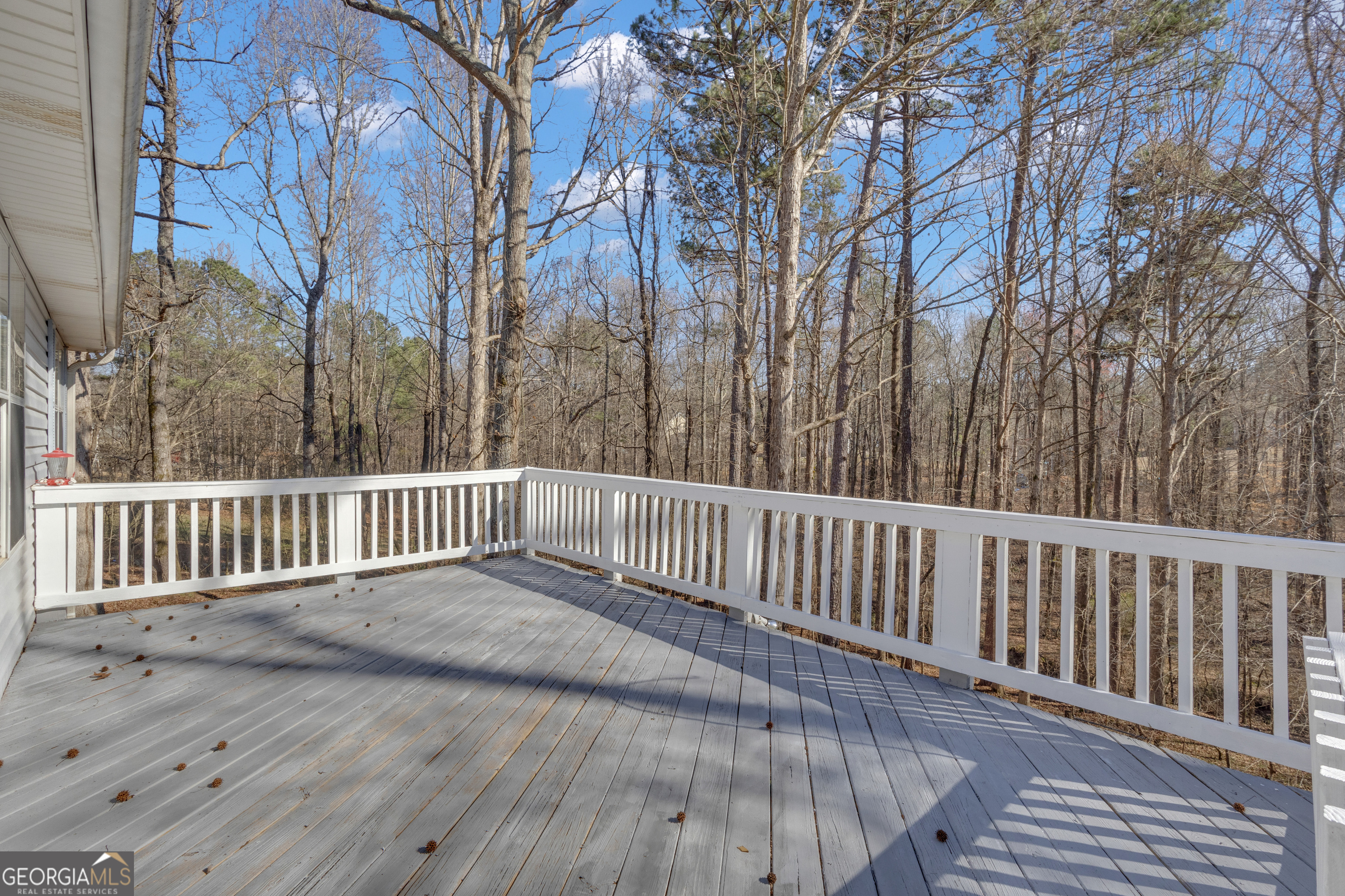 918 Scarletts Walk Locust Grove, GA 30248 - Photo 38 of 46 a view of deck with wooden floor and fence