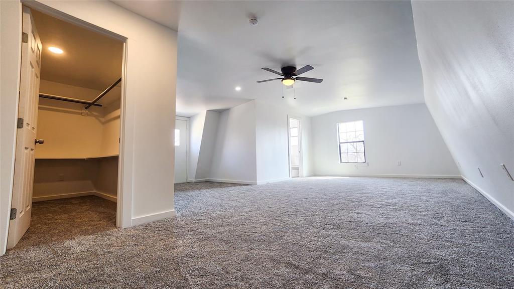 401 East Pierce Street Winters, TX 79567 - Photo 18 of 25 a view of an empty room with a window