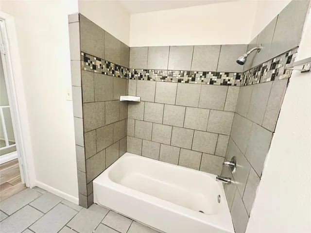 a bathroom with a bathtub