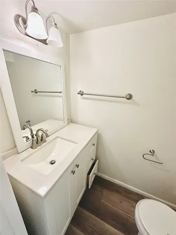 a bathroom with a sink and mirror
