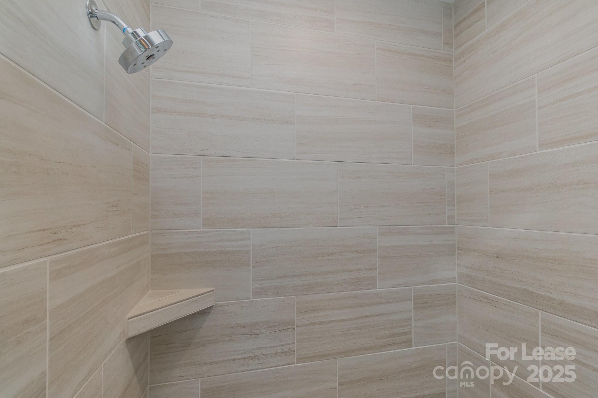 3224 Everly Enclave Way Charlotte, NC 28210 - Photo 17 of 24 a bathroom with a shower