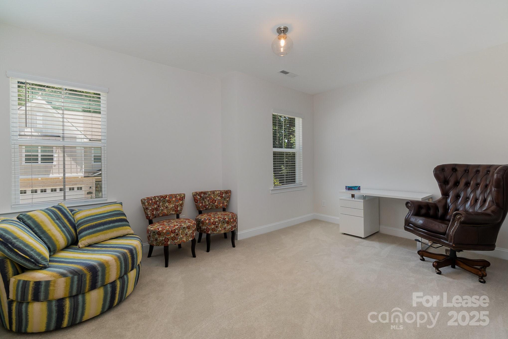 3224 Everly Enclave Way Charlotte, NC 28210 - Photo 21 of 24 a living room with furniture