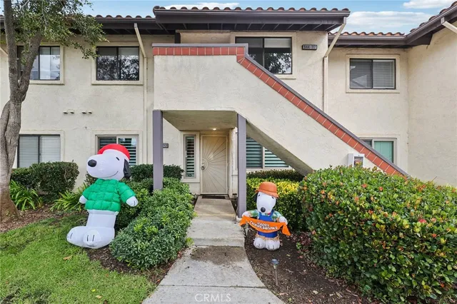 a front view of a house with an outdoor space
