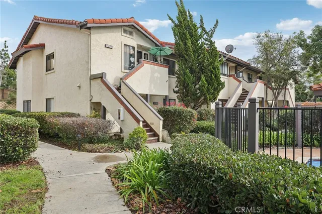 a house view with a outdoor space