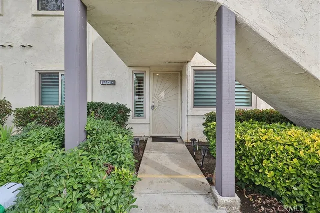 view of a pathway both side of house