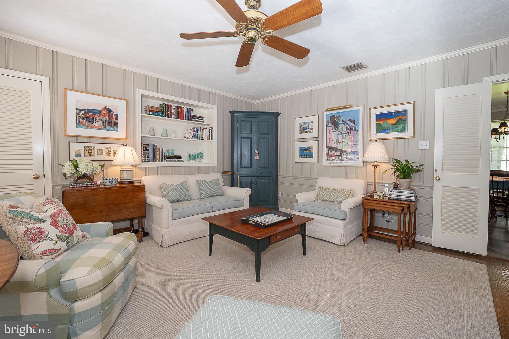 712 Woodcrest Road Wayne, PA 19087 - Photo 8 of 34 Family room with paneling and shelving