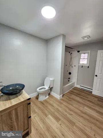a bathroom with a sink and a toilet