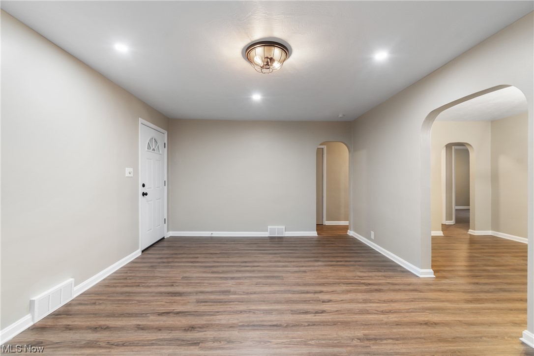 916 Renninger Road Akron, OH 44319 - Photo 14 of 31 Unfurnished room with hardwood / wood-style flooring