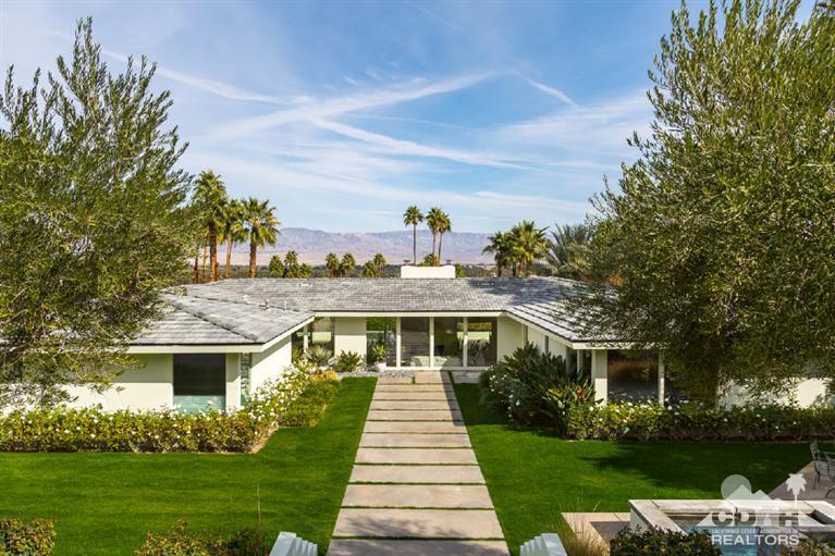 70288 Calico Road Rancho Mirage, CA 92270 - Photo 1 of 20 a front view of house with yard and green space