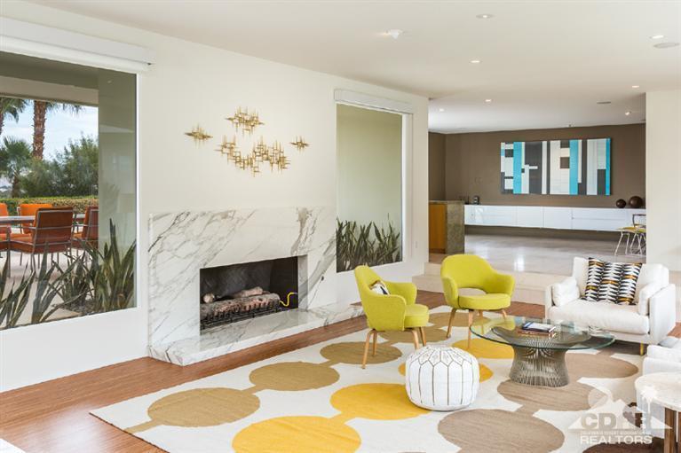 70288 Calico Road Rancho Mirage, CA 92270 - Photo 12 of 20 a living room with furniture and a fireplace