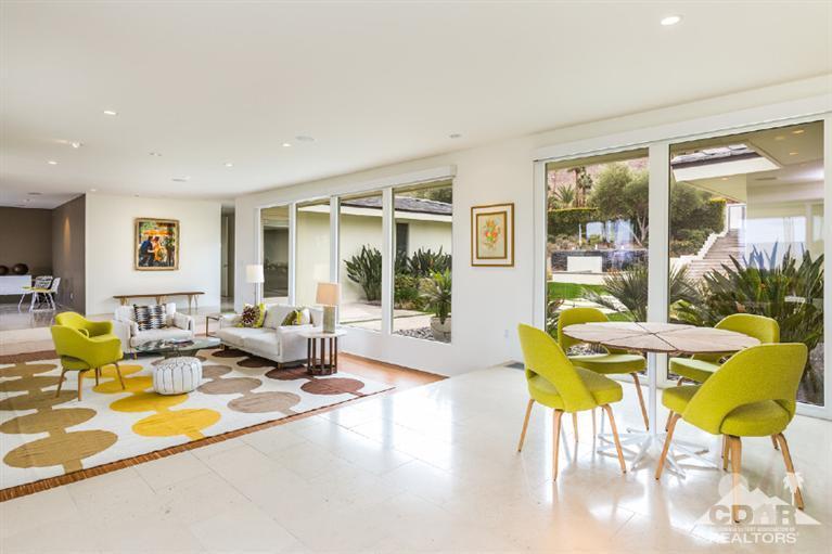 70288 Calico Road Rancho Mirage, CA 92270 - Photo 13 of 20 a living room with furniture and a large window