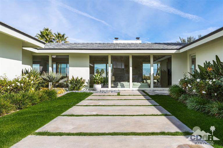 70288 Calico Road Rancho Mirage, CA 92270 - Photo 5 of 20 a view of a house with garden and plants