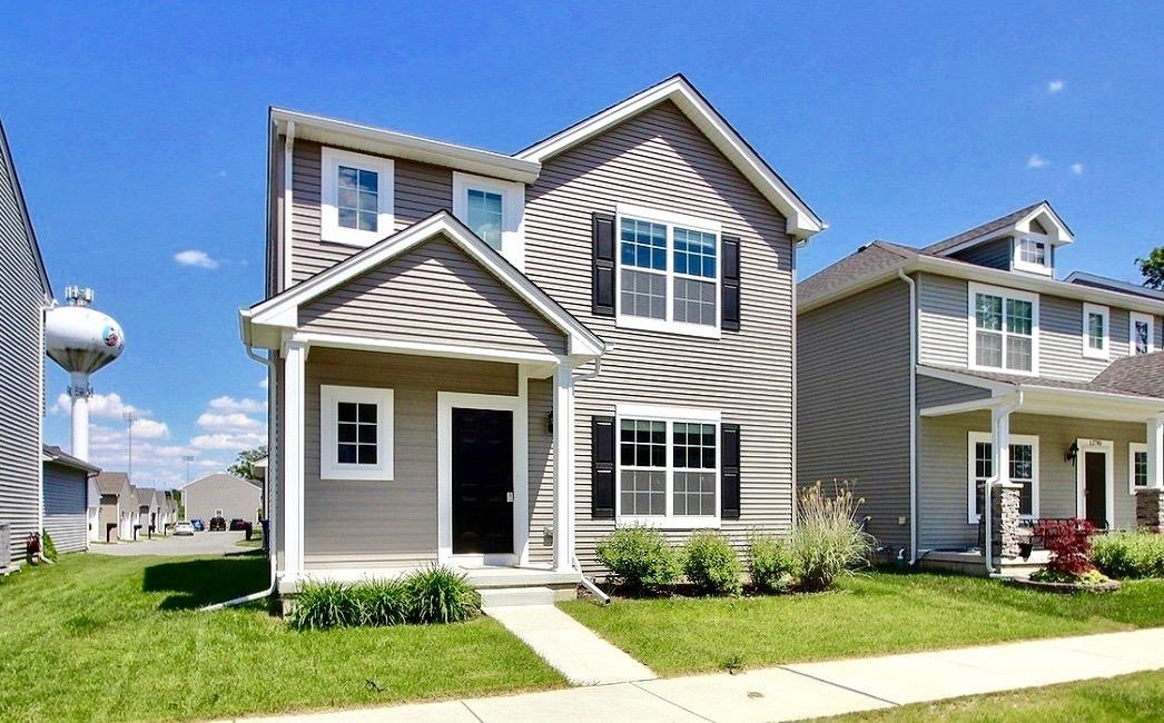 12776 Rutledge Place Crown Point, IN 46307 - Photo 1 of 1 a front view of a house with a yard