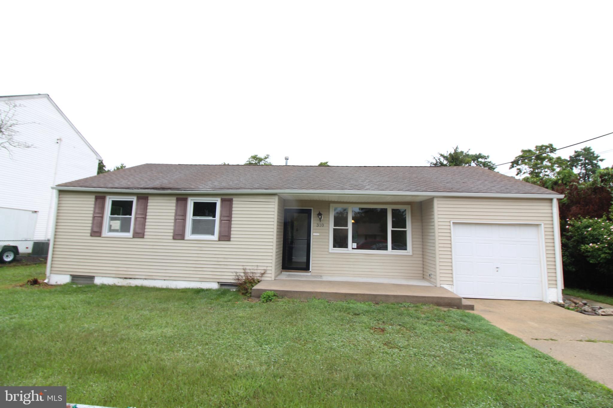 310 Piute Trail Browns Mills, NJ 08015 - Photo 2 of 23 front view of a house with a yard