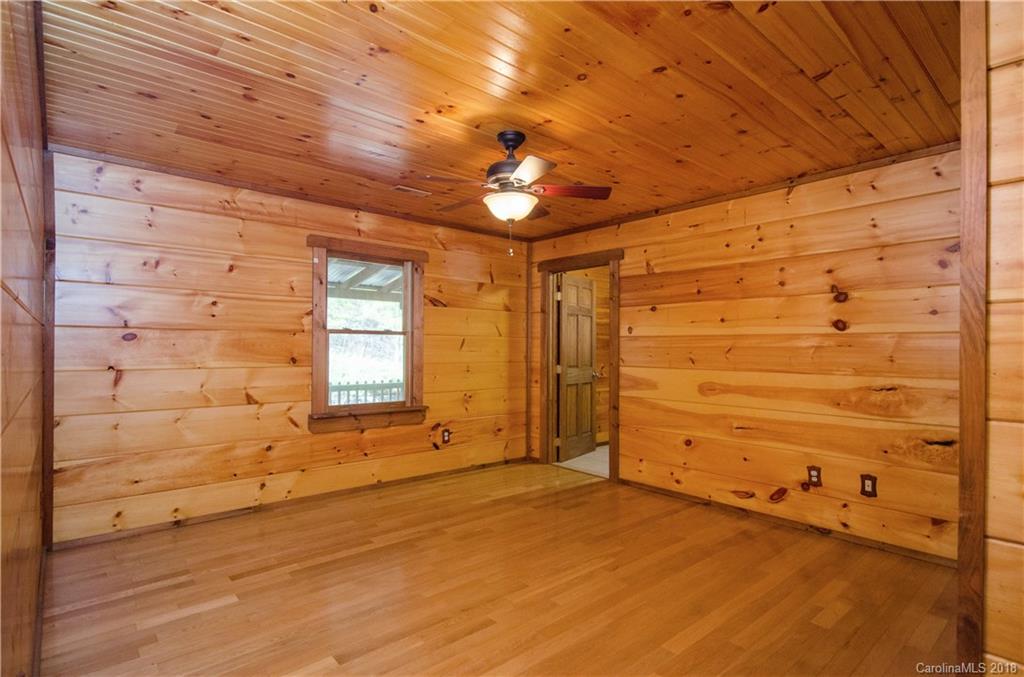 139 Stanley Ln Mill Spring, Unit 8 Mill Spring, NC 28756 - Photo 13 of 22 a view of an empty room with a window
