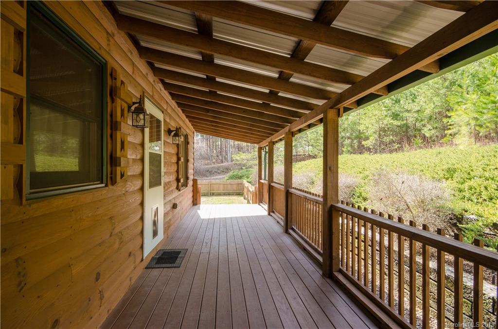 139 Stanley Ln Mill Spring, Unit 8 Mill Spring, NC 28756 - Photo 17 of 22 a view of a balcony with wooden floor