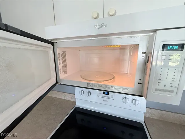 a bathroom with a sink a mirror and a shower