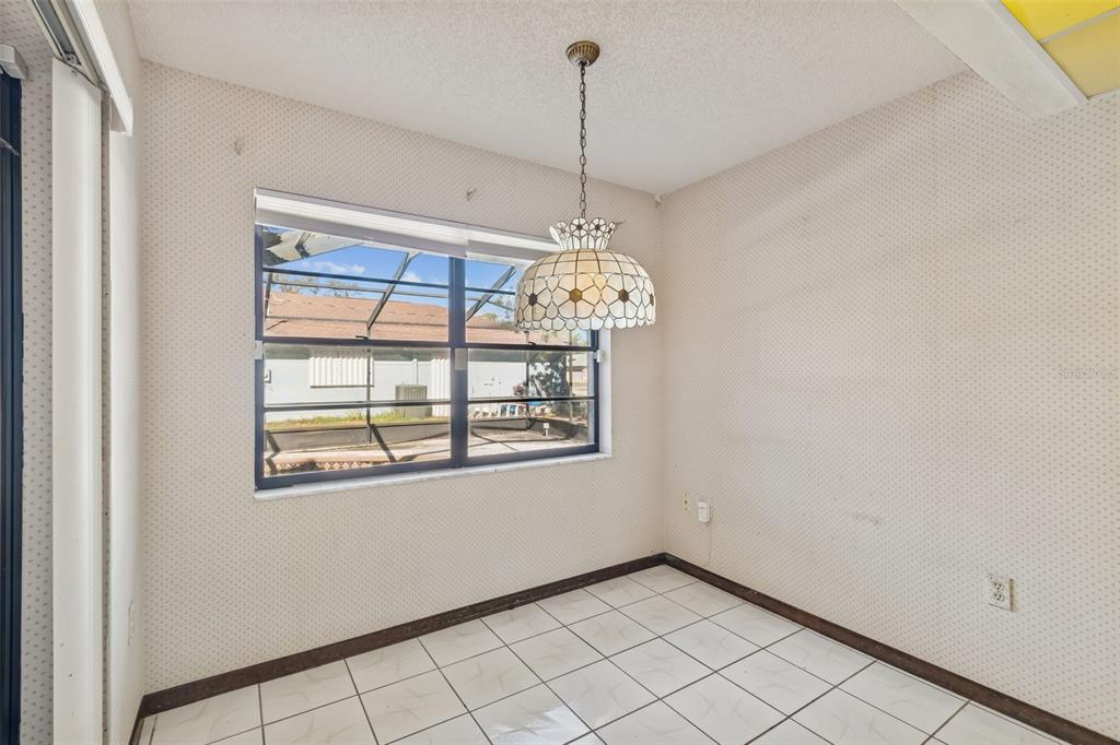 2051 Laredo Avenue Spring Hill, FL 34608 - Photo 20 of 76 a view of an empty room with a window