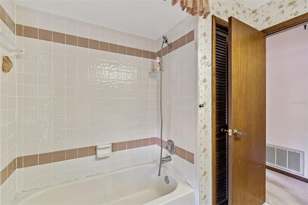 2051 Laredo Avenue Spring Hill, FL 34608 - Photo 28 of 76 a bathroom with a bathtub and a shower