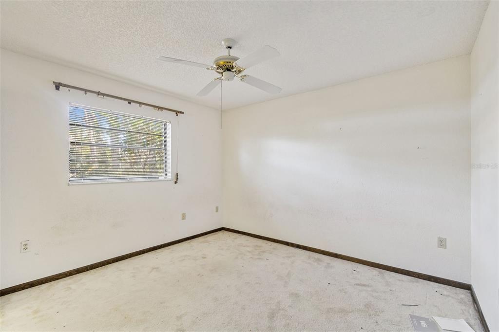 2051 Laredo Avenue Spring Hill, FL 34608 - Photo 29 of 76 an empty room with a window