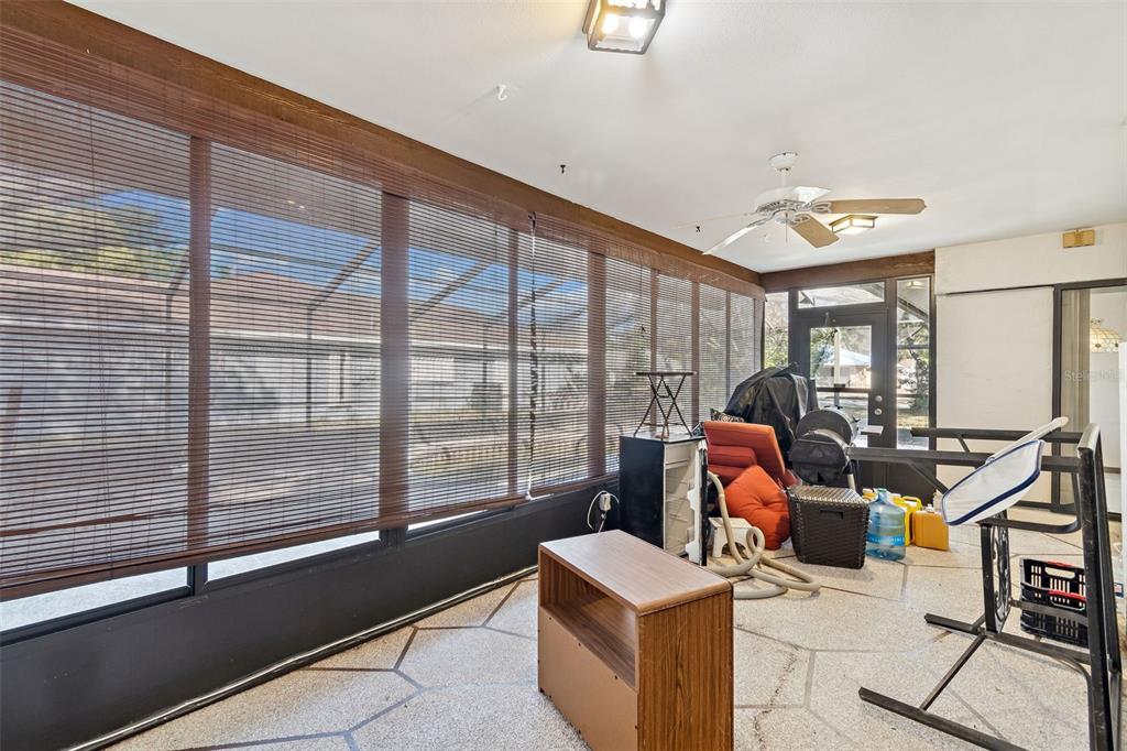 2051 Laredo Avenue Spring Hill, FL 34608 - Photo 49 of 76 a room with gym equipment and a large window