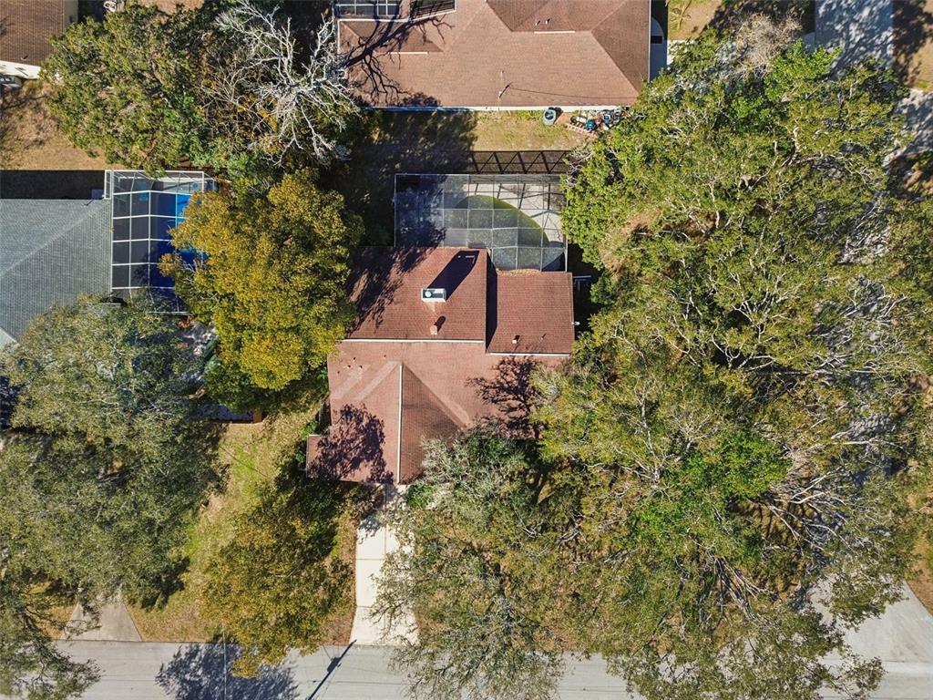 2051 Laredo Avenue Spring Hill, FL 34608 - Photo 68 of 76 an aerial view of a house with a yard