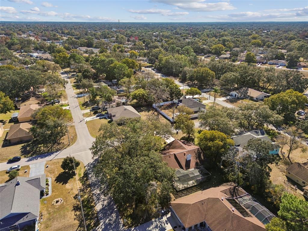 2051 Laredo Avenue Spring Hill, FL 34608 - Photo 69 of 76 an aerial view of a residential houses and city street