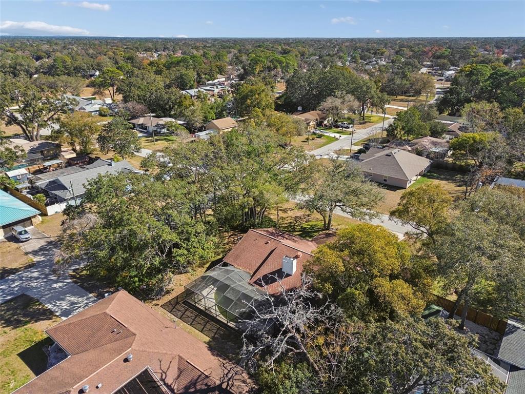 2051 Laredo Avenue Spring Hill, FL 34608 - Photo 72 of 76 an aerial view of a house with a yard