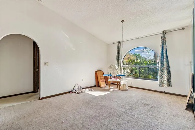 a kitchen with stainless steel appliances a sink stove and cabinets