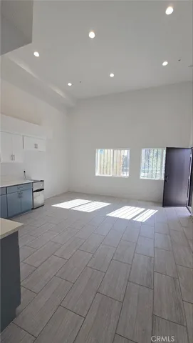 a kitchen with stainless steel appliances granite countertop a sink and cabinets