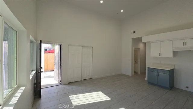 a view of an empty room and window