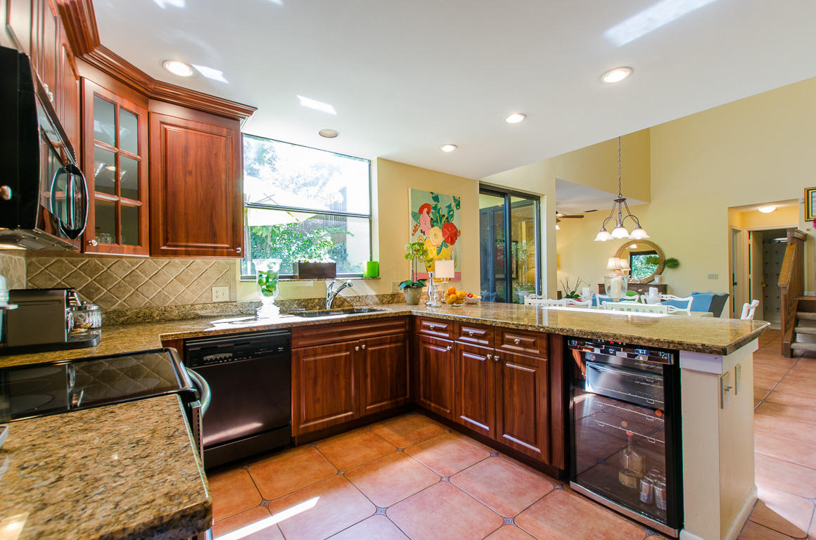 5789 Fox Hollow Drive, Unit C Boca Raton, FL 33486 - Photo 14 of 47 53- Kitchen Wine Frig