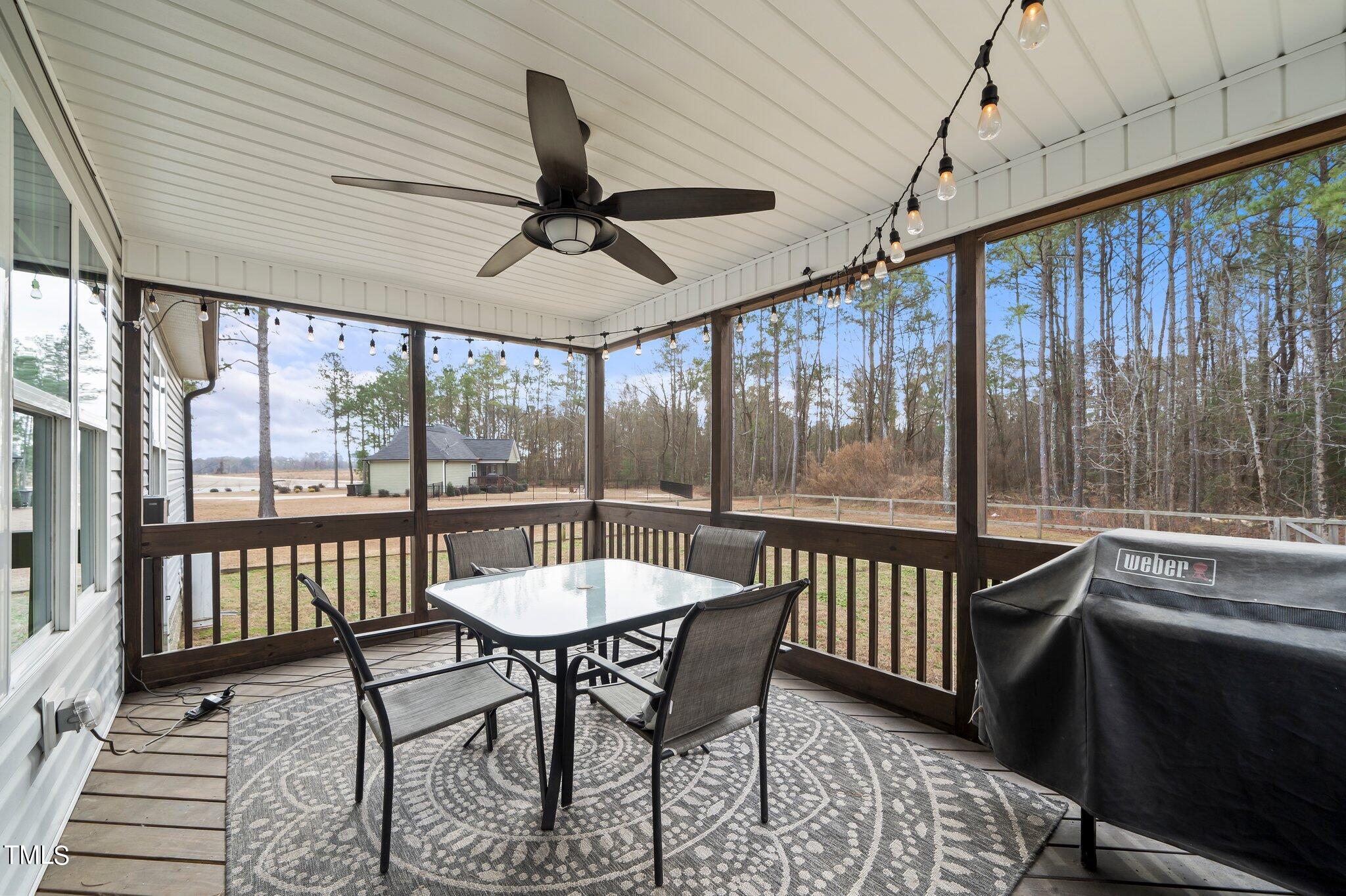 3195 Johnston County Road Angier, NC 27501 - Photo 15 of 31 a view of a dining room with furniture window and outside view