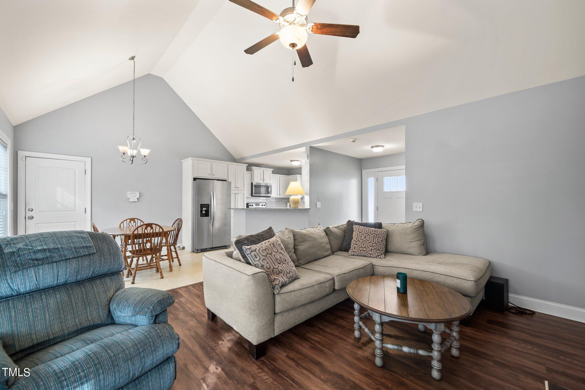 3195 Johnston County Road Angier, NC 27501 - Photo 8 of 31 a living room with furniture and a ceiling fan