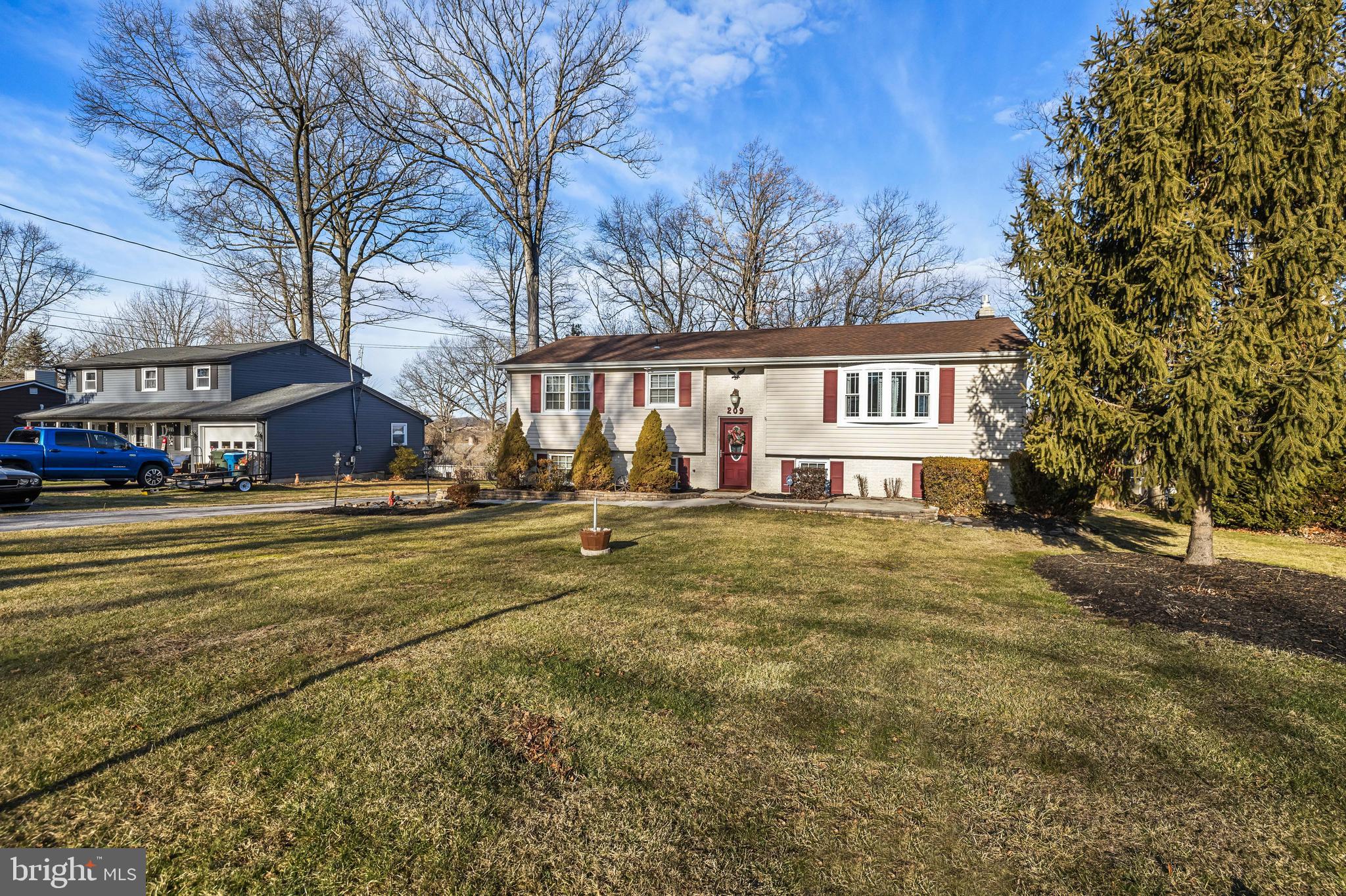 209 Forest Hills Road Red Lion, PA 17356 - Photo 2 of 43 a view of swimming pool with outdoor seating and covered with trees