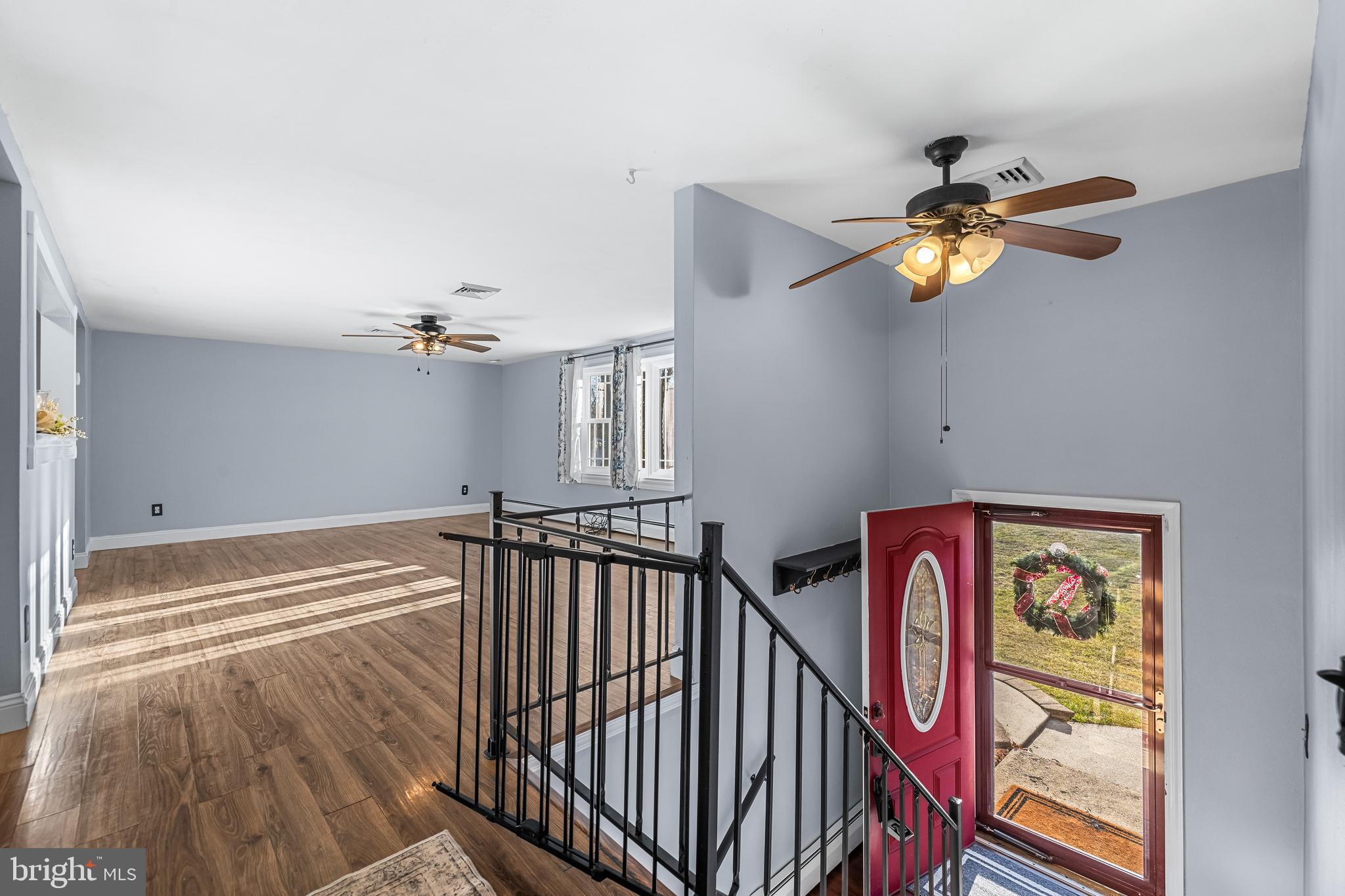 209 Forest Hills Road Red Lion, PA 17356 - Photo 3 of 43 a view of entryway and hall with wooden floor