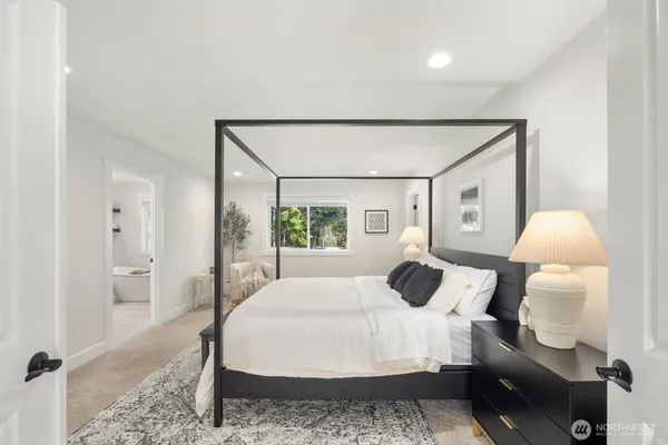 a bathroom with a sink vanity and a mirror