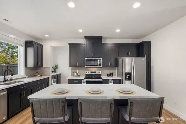 a table and a window in a room