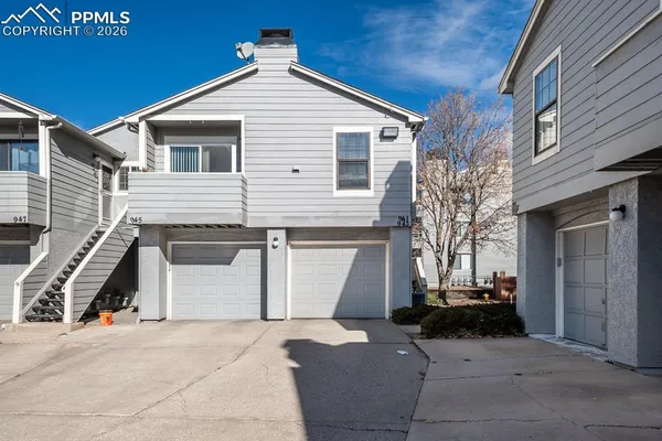 a view of a house with a garage