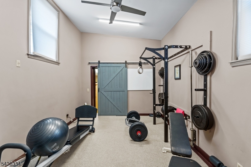 271 Quakertown Road, Unit 2 Pittstown, NJ 08867 - Photo 11 of 25 a view of a room with gym equipment