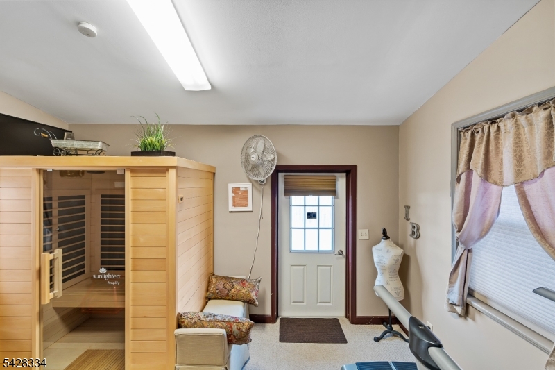 271 Quakertown Road, Unit 2 Pittstown, NJ 08867 - Photo 13 of 25 a view of living room with furniture and wooden floor