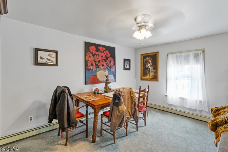 271 Quakertown Road, Unit 2 Pittstown, NJ 08867 - Photo 18 of 25 a dining room with furniture and window
