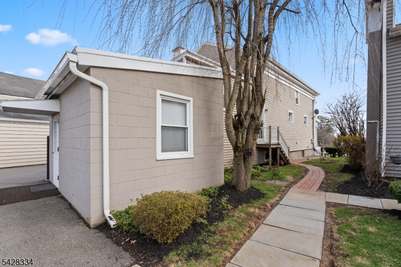 271 Quakertown Road, Unit 2 Pittstown, NJ 08867 - Photo 25 of 25 a front view of a house with garden